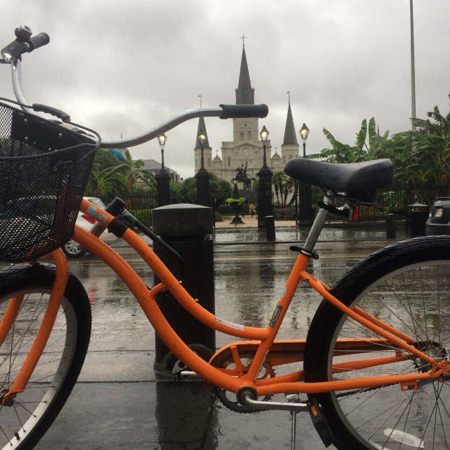 Pausing for a bike portrait in front of Jackson Square